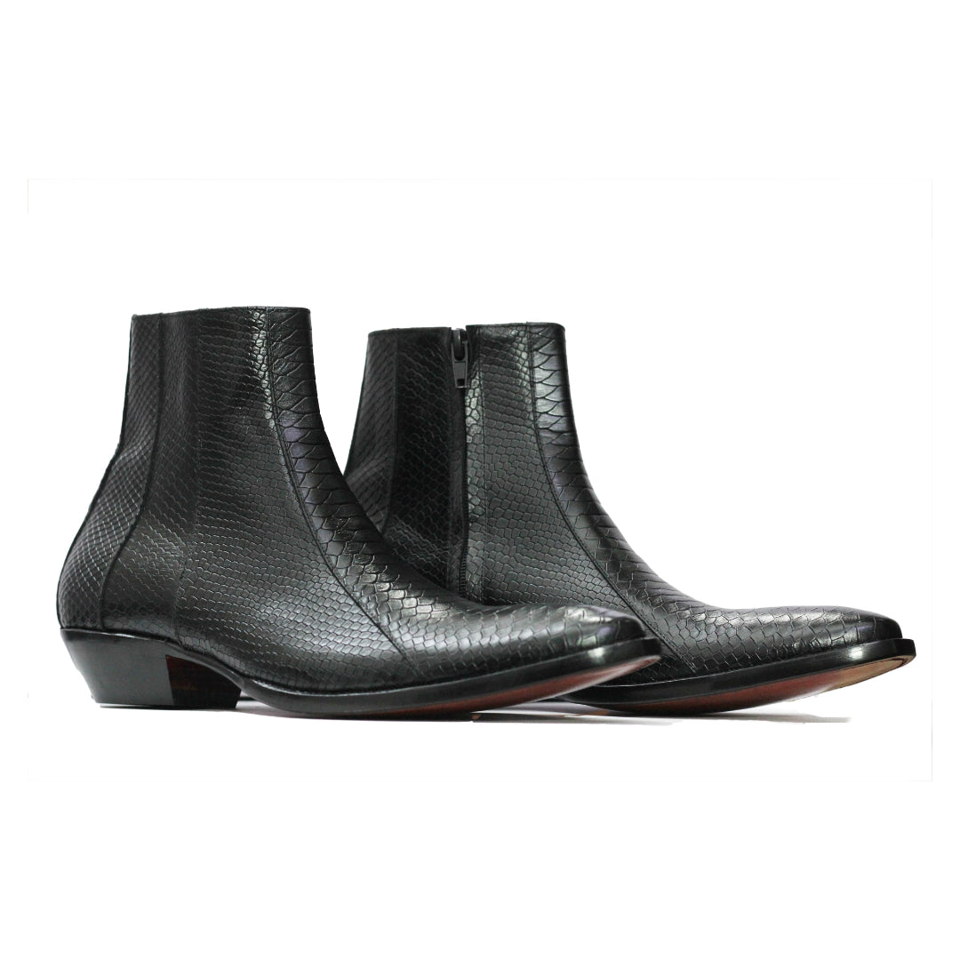 Pair of black textured ankle boots on a white background