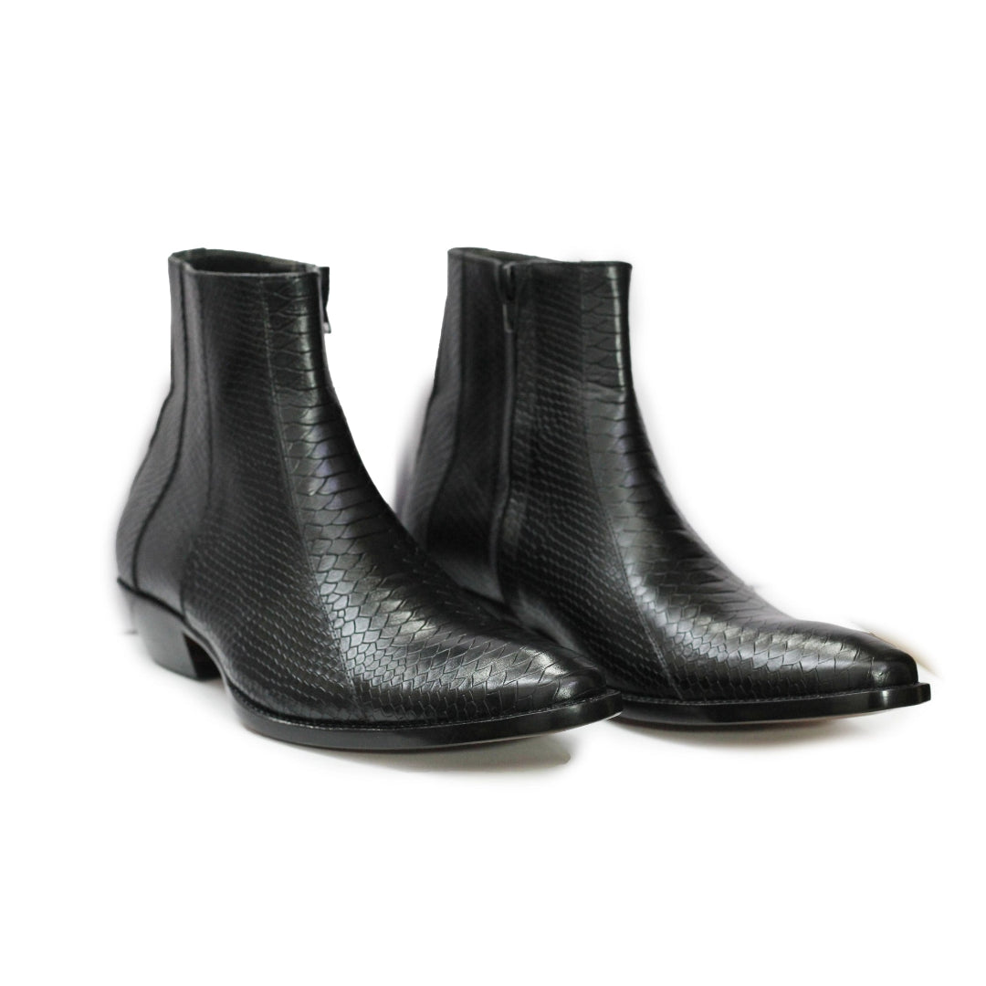 Pair of black textured ankle boots on a white background