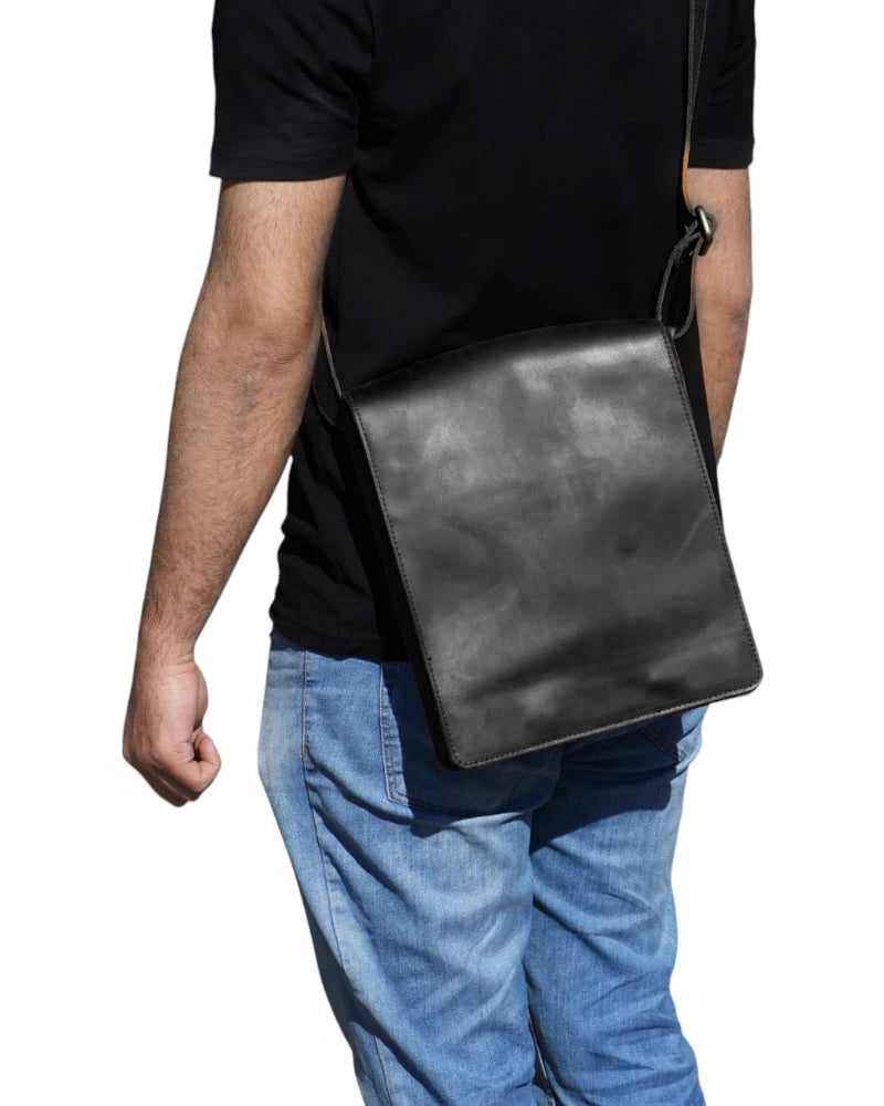 Elegant Black men leather messenger bag placed shoulder mendesk