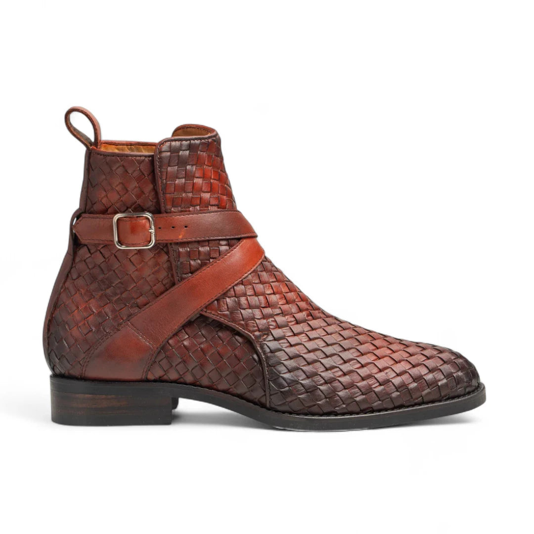Brown woven leather boot with a strap and buckle on a white background