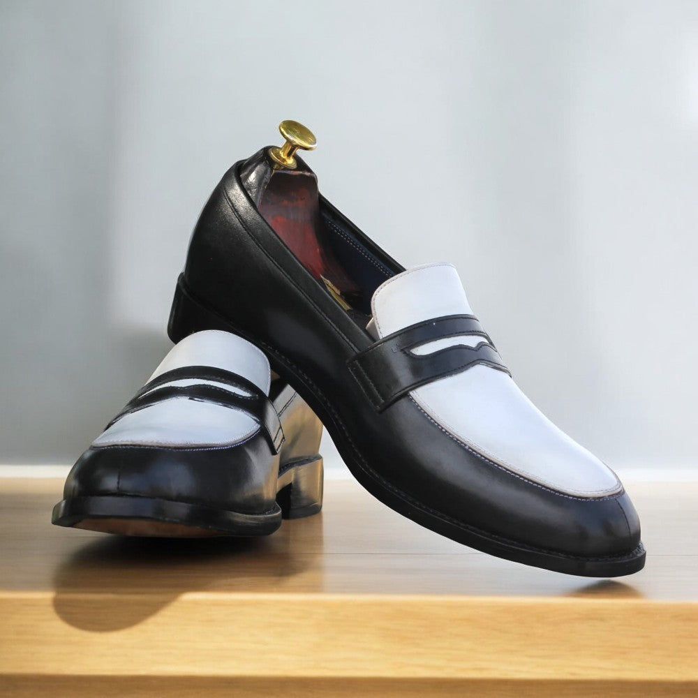 Black and white leather penny loafers on white background from Posh Footwears