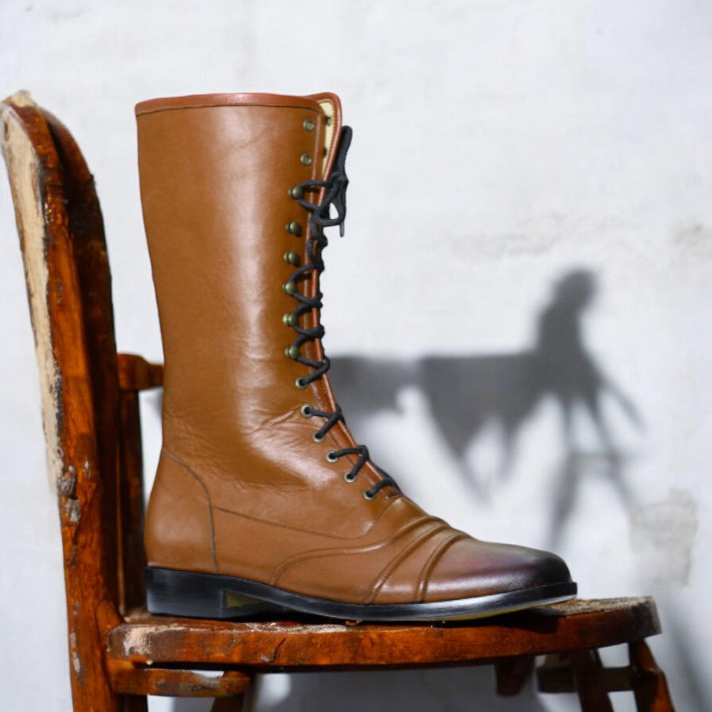 Handmade men's cap toe long boots in tan leather, premium craftsmanship