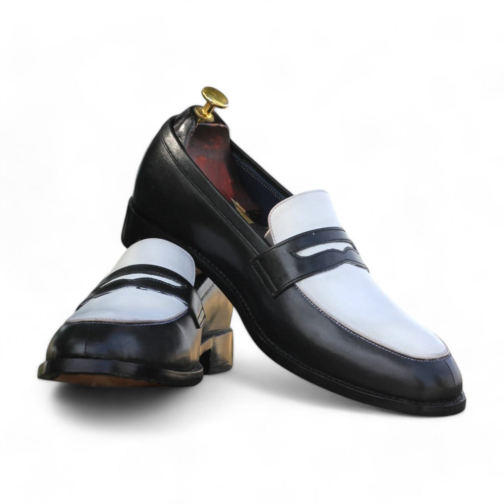Black and white leather penny loafers on white background from Posh Footwears