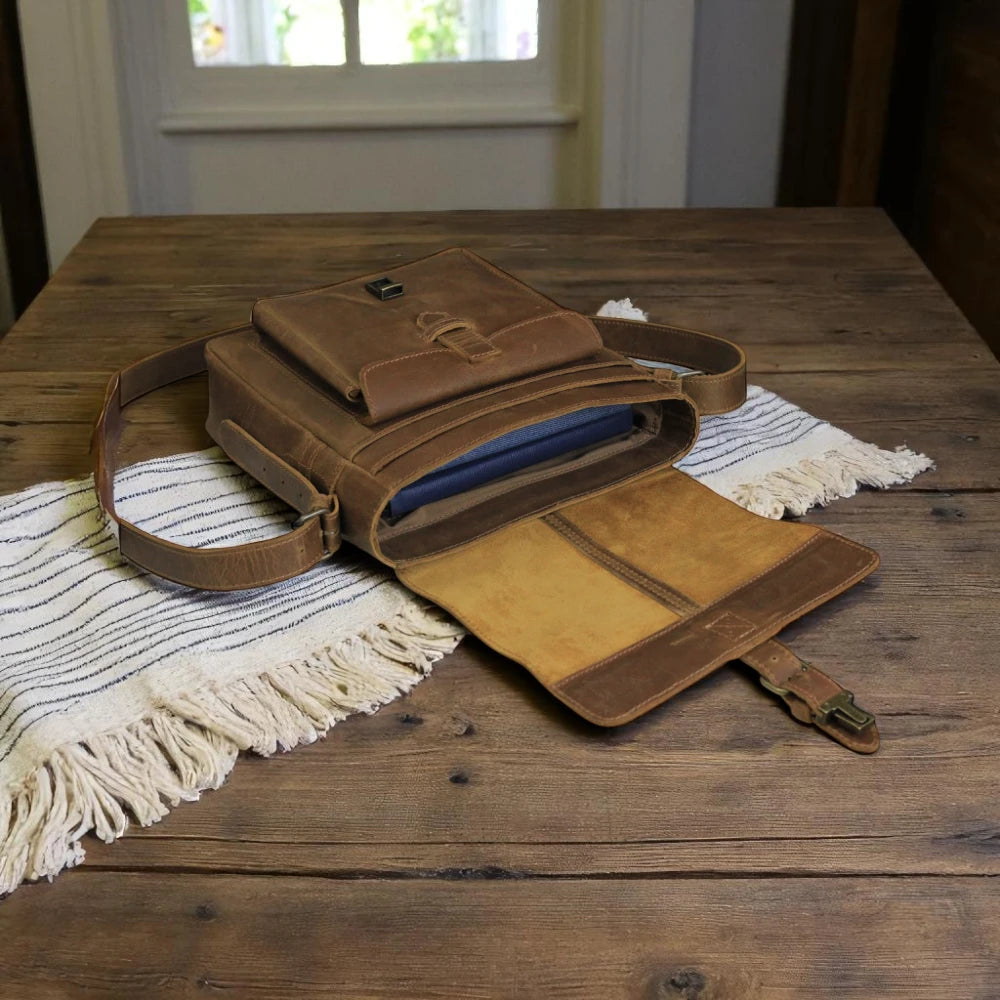 inSide profile showing bag depth and strap attachment

