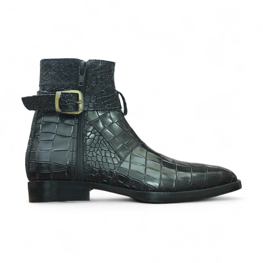 Black crocodile-patterned boot with a buckle on a white background
