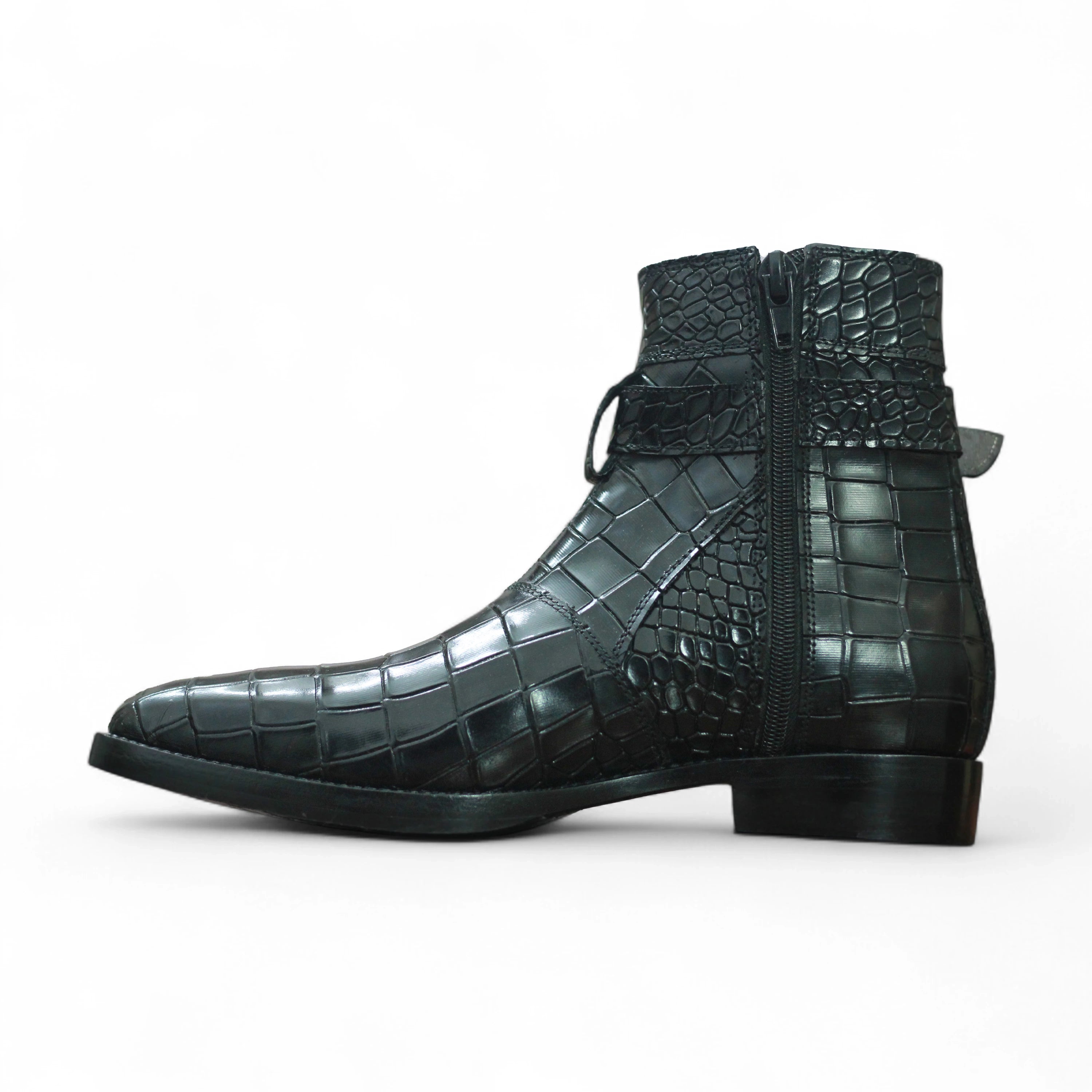 Black crocodile-patterned leather boot on a white background