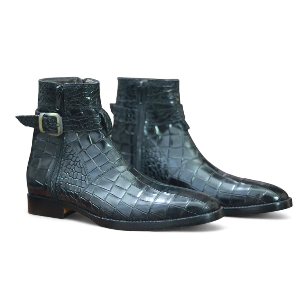 Black crocodile-patterned boot with a buckle on a white background