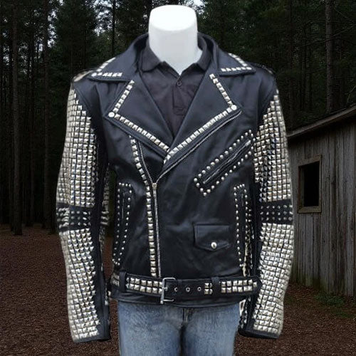 Black leather jacket with silver studs on a mannequin against a forest background