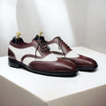 Handmade two-tone leather wingtip Oxfords in brown and white, with leather sole and available in USA sizes 5-15