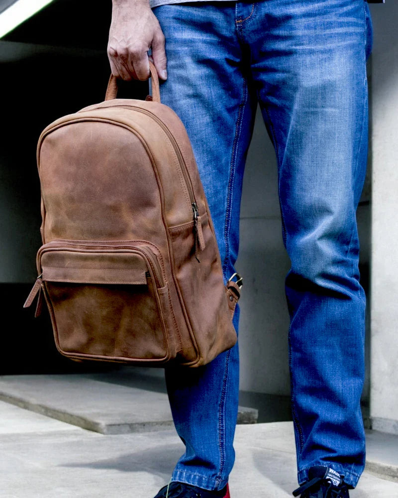 Stylish Leather Office Backpack for Work and Travel – Professional and rugged, suitable for carrying laptops, notebooks, and daily essentials.