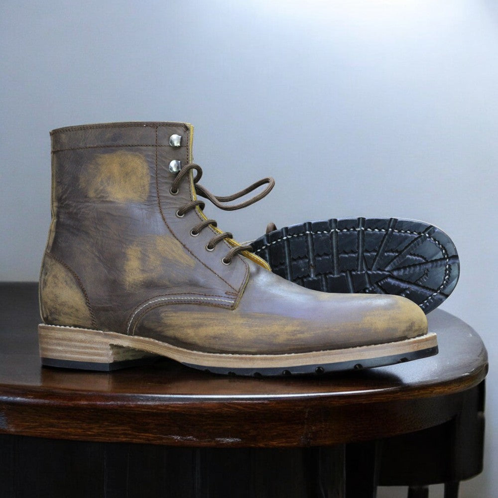 Men's vintage brown ankle boots made from genuine leather, showcasing a distressed finish and a classic design for a stylish, rugged look.