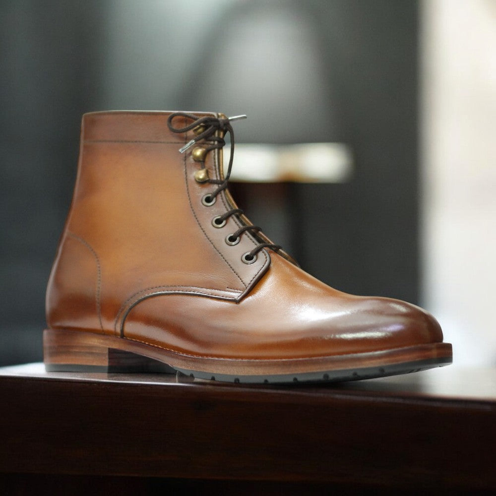 Men's handmade ankle boots crafted from premium leather, featuring a sleek design and durable construction for both style and comfort, perfect for versatile wear in any season.