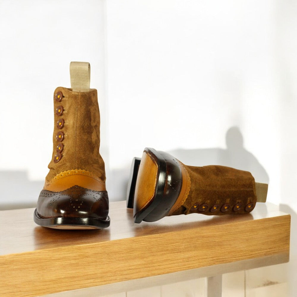 Men's Leather Suede Button Boots displayed on a wooden surface, showcasing their elegant design and craftsmanship.