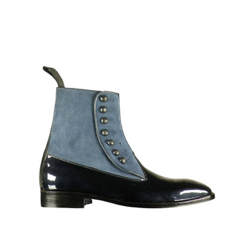 Men's Leather Suede Button Boots displayed on a wooden surface, showcasing their elegant design and craftsmanship.