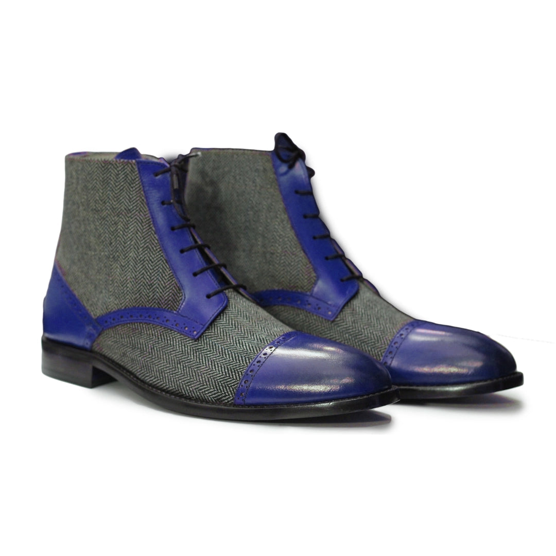 Back View – Rear angle of Men’s Designer Ankle Boots, featuring a two-tone tweed and leather design with a durable leather sole for stability.
