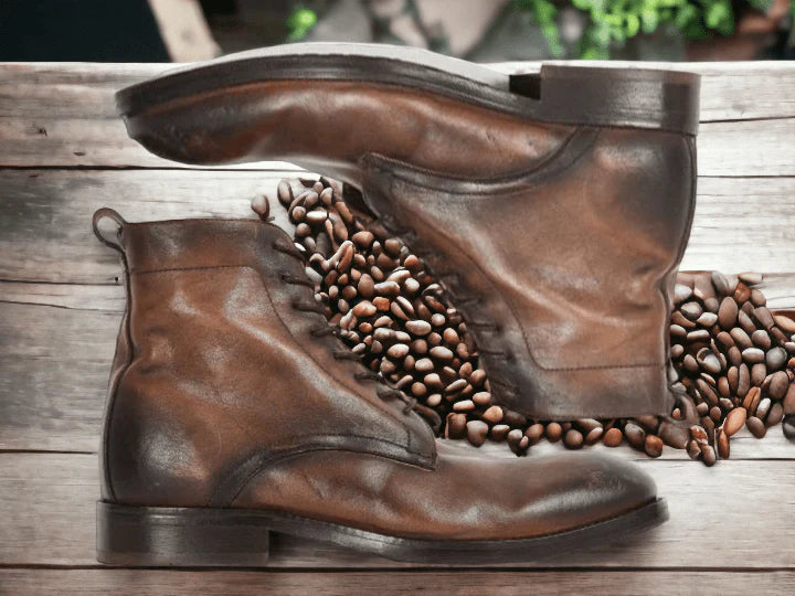 Men's brown leather ankle boots with a sleek design, featuring premium full-grain leather, cushioned insoles, and durable rubber soles for comfort and style.







