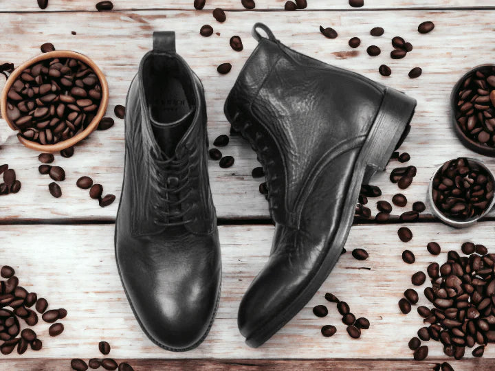 Men's brown leather ankle boots with a sleek design, featuring premium full-grain leather, cushioned insoles, and durable rubber soles for comfort and style.