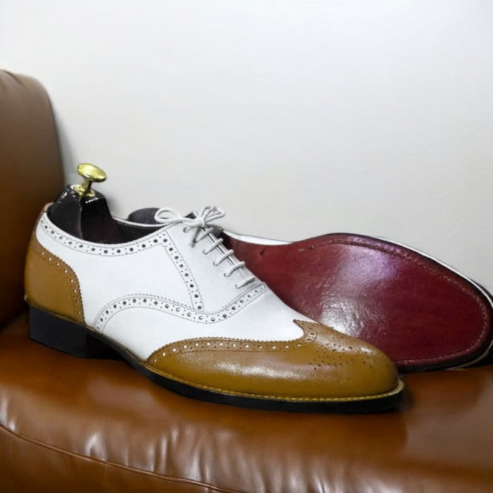 Premium leather oxford shoes for men, featuring a sleek design and shiny finish