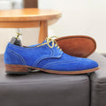 Men's blue suede lace-up Oxfords with wingtip design