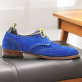 Men's blue suede lace-up Oxfords with wingtip design