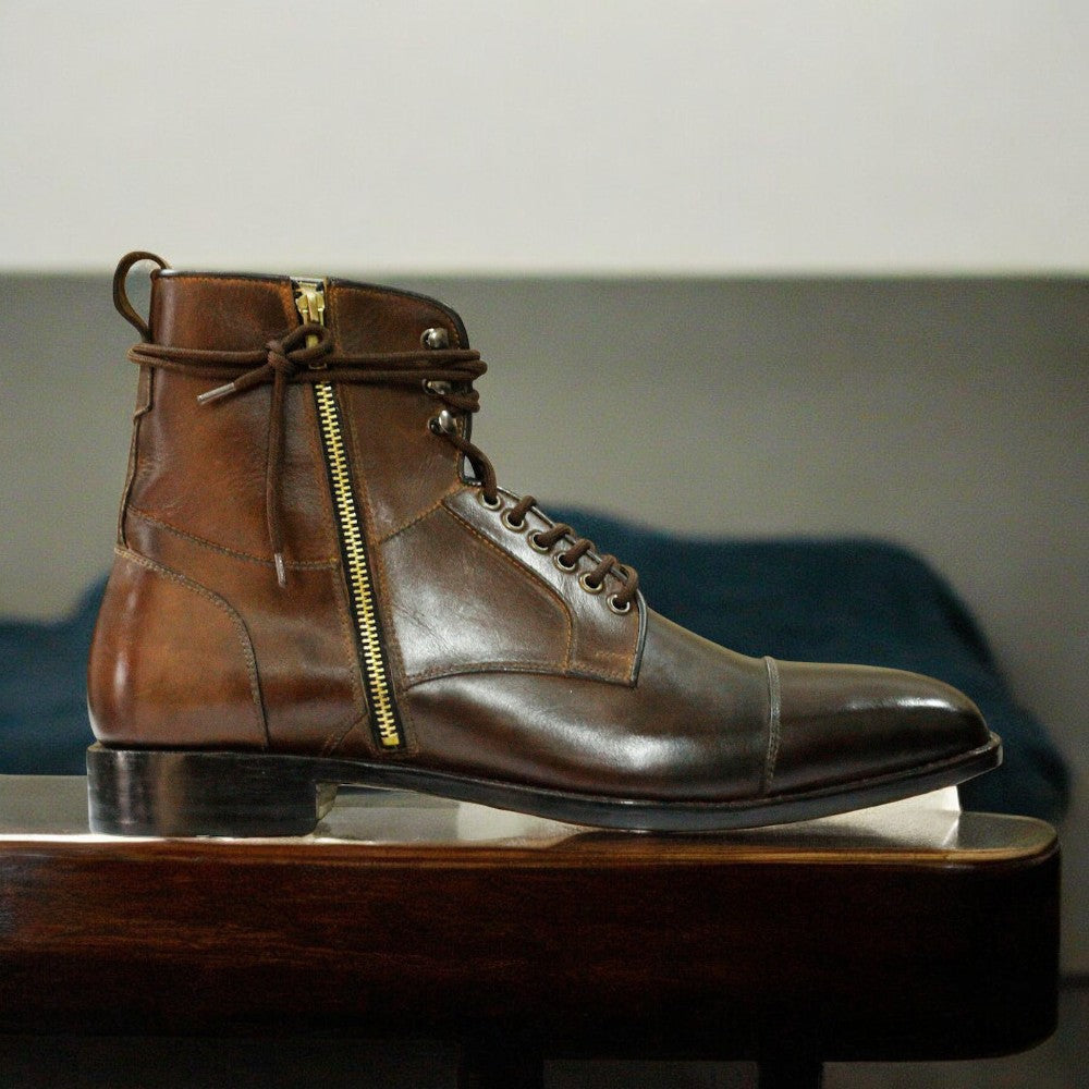 Men's brown genuine leather combat boots with a rugged military design, featuring reinforced stitching and a durable sole for optimal comfort and support