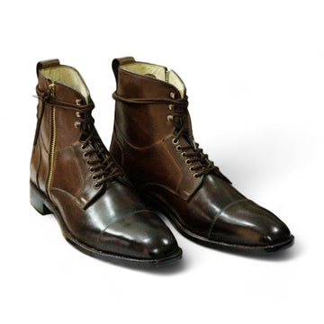 Men's brown genuine leather combat boots with a rugged military design, featuring reinforced stitching and a durable sole for optimal comfort and support