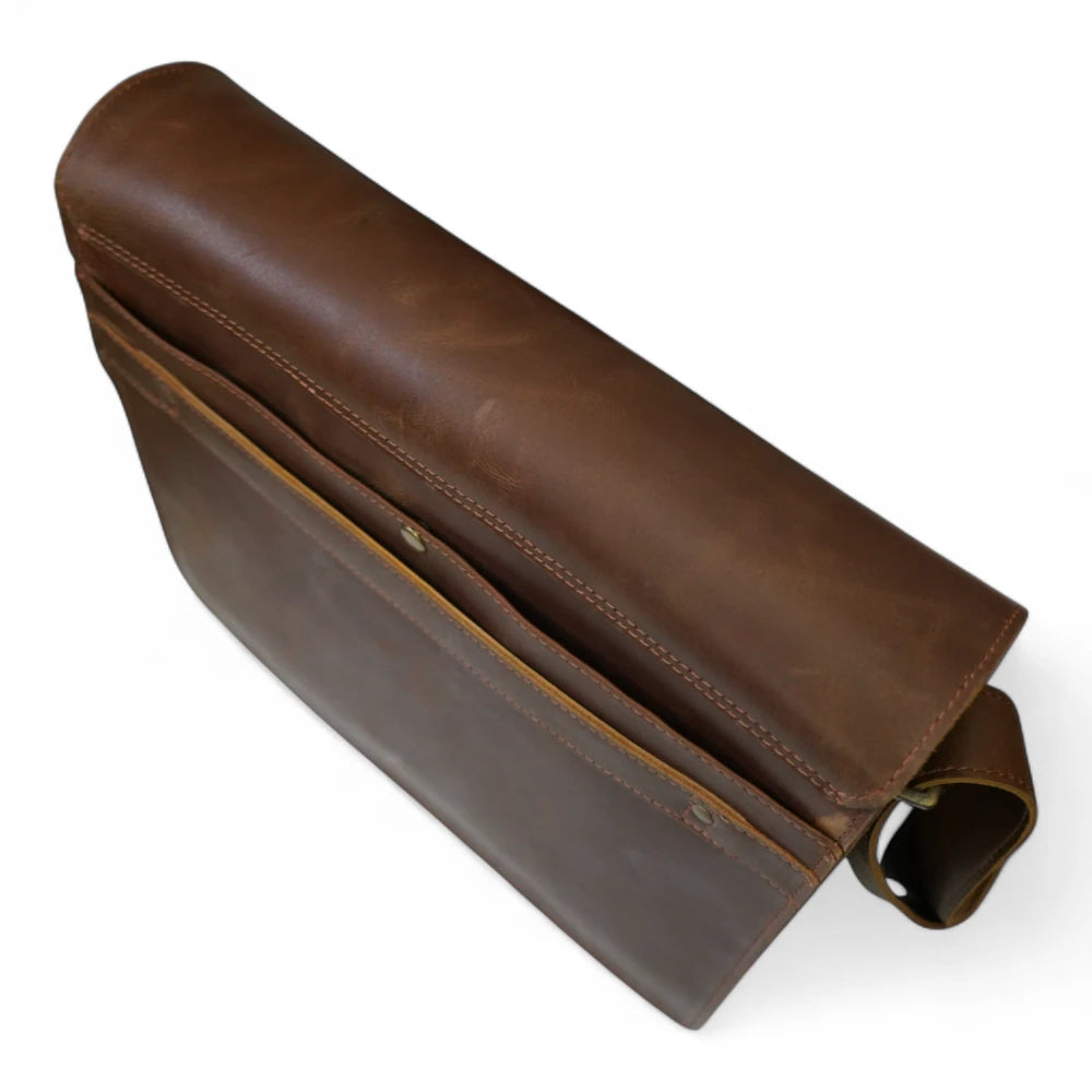 Back View – Rear angle displaying the large buttoned compartment and clean stitching.

