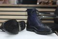 Stylish navy blue boots with durable design, perfect for versatile casual and formal wear.
