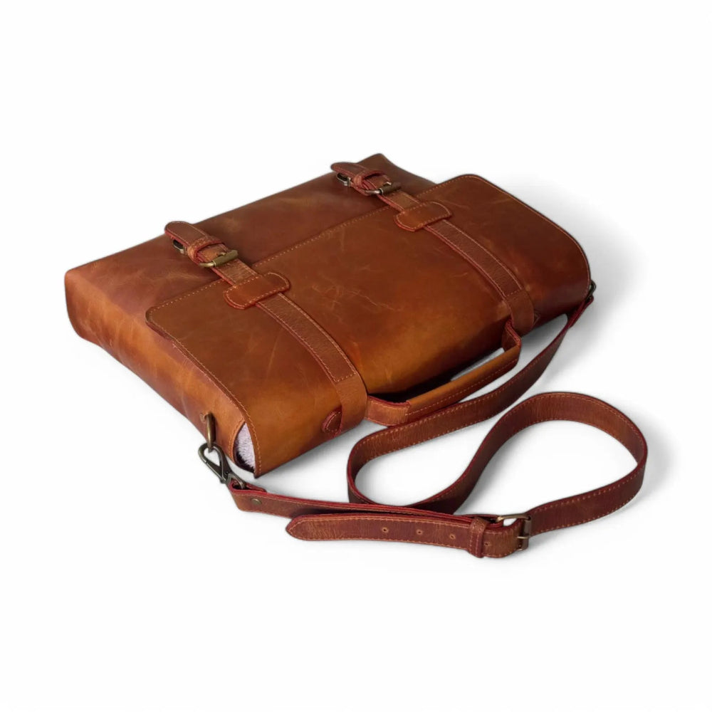Front View – Leather messenger bag with classic flap and buckle clasp

