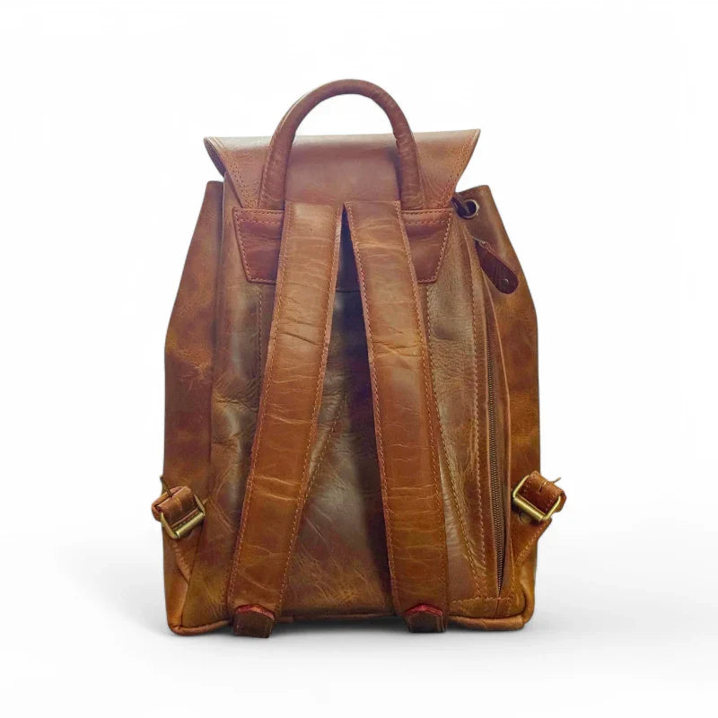 Expertly crafted from genuine leather, this handmade backpack is perfect for college students. The backpack features a front pocket for easy access to essentials, making it a practical and stylish choice for everyday use. Stay organized and look sophisticated with the Country Leather Backpack.