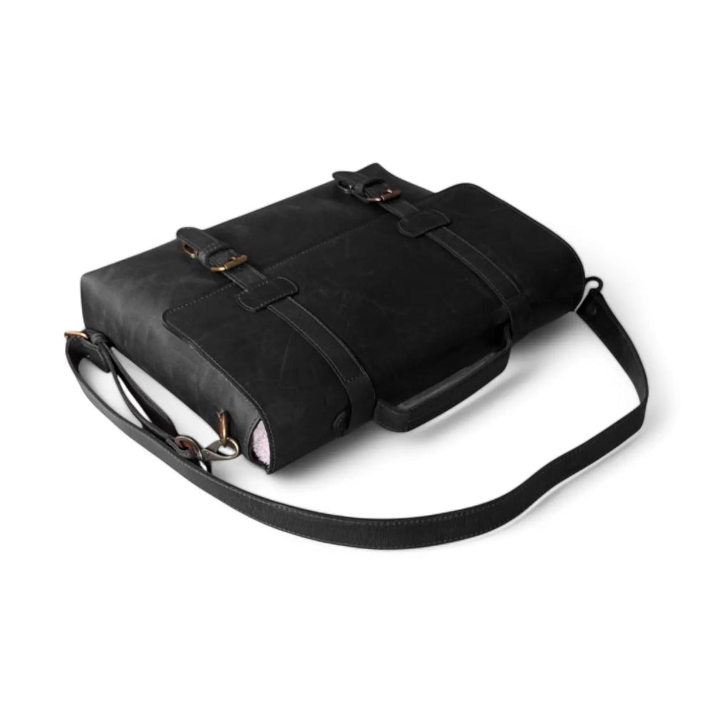 Front View – Leather messenger bag with classic flap and buckle clasp

