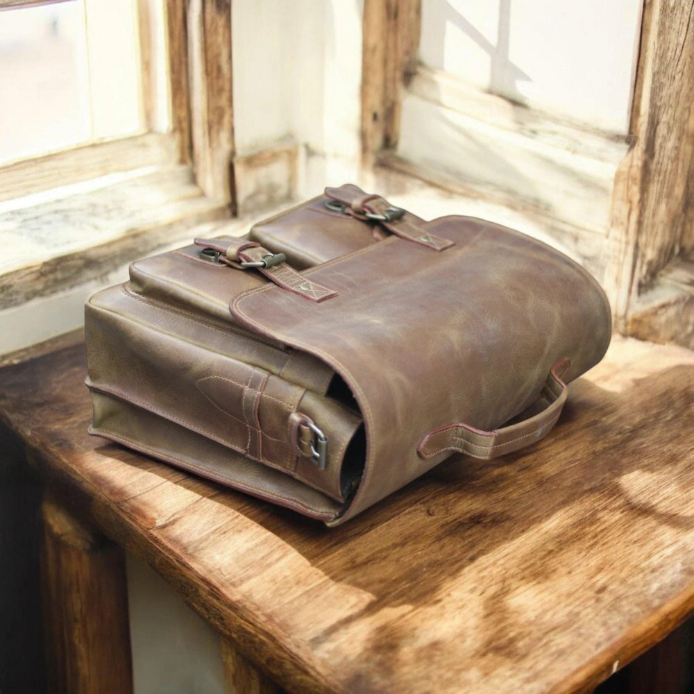 Side view showing briefcase depth and leather grain

