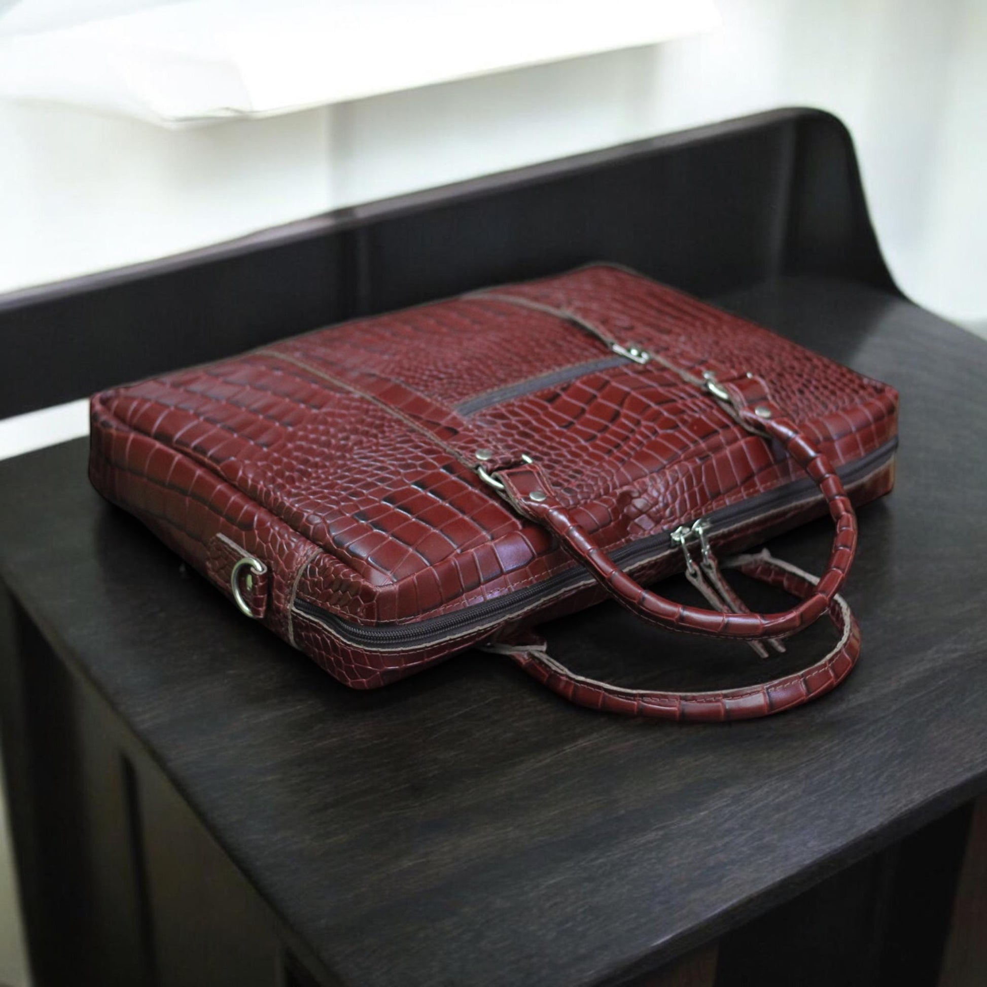 Top View – Overhead look at zippered or magnetic flap opening with leather grain detail.

