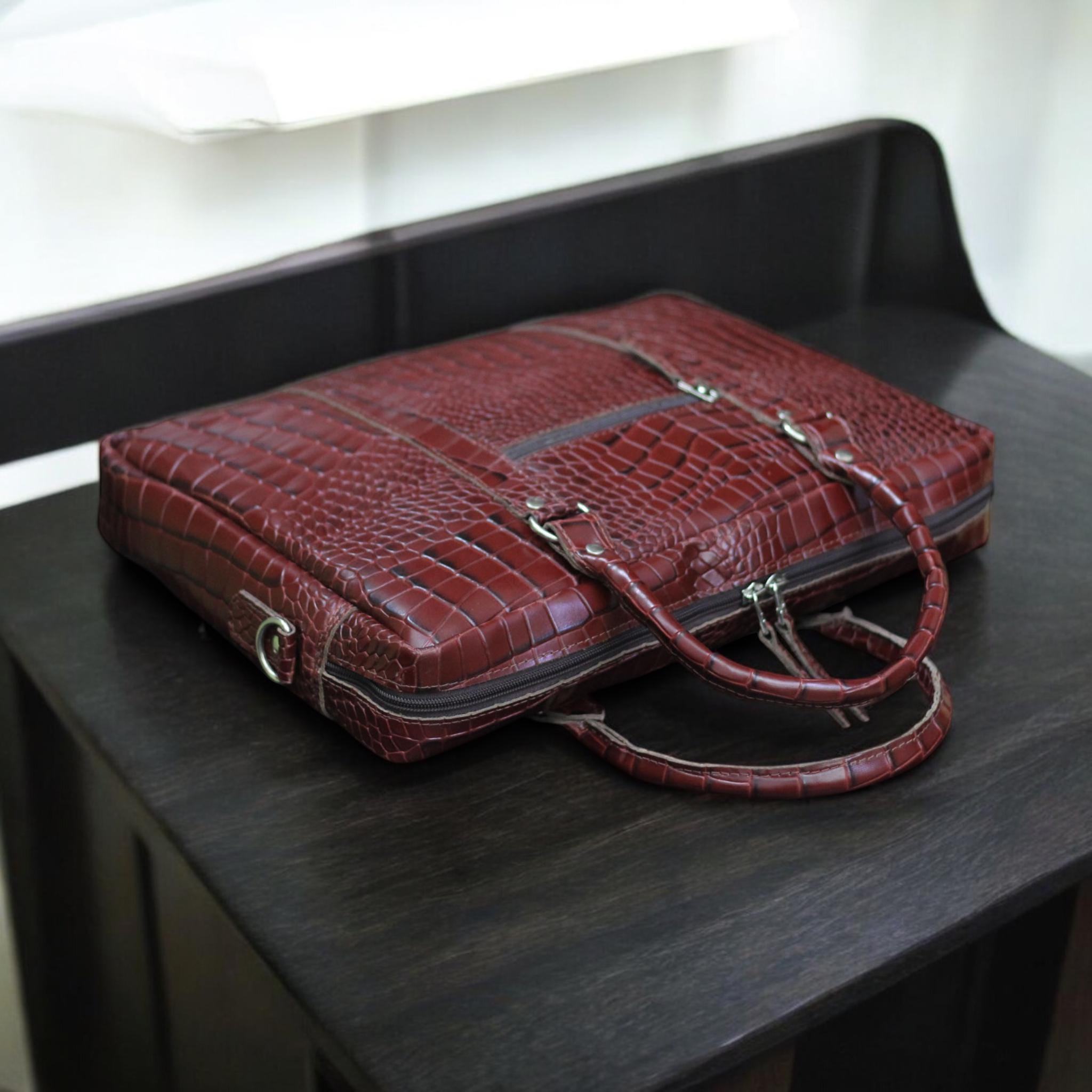 Top View – Overhead look at zippered or magnetic flap opening with leather grain detail.

