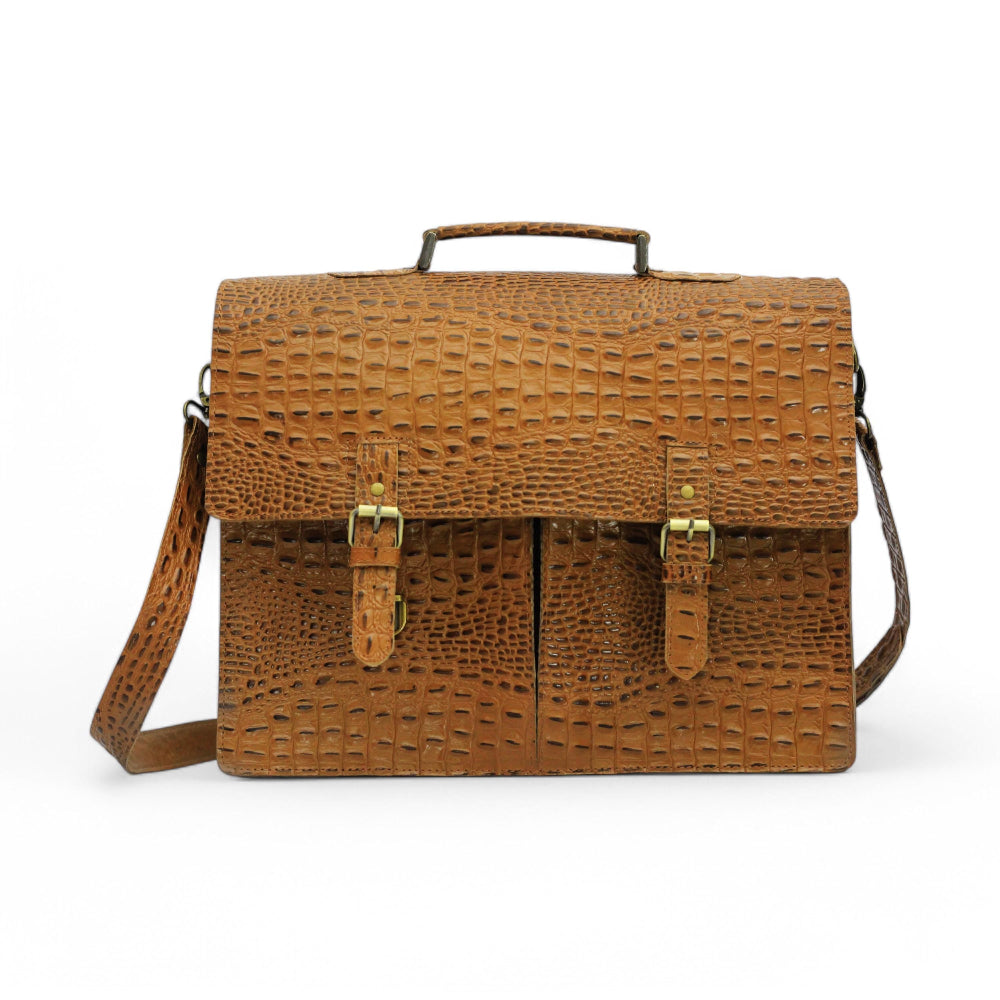 Expertly crafted with genuine alligator print leather, this handmade tan bag is perfect for the office or daily use. Its spacious design can accommodate a laptop, making it the ideal choice for tech-savvy professionals. A sophisticated and stylish choice for men, this bag is sure to elevate any outfit.