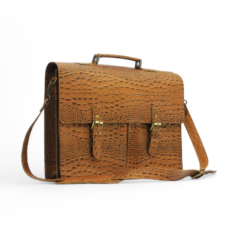 Expertly crafted with genuine alligator print leather, this handmade tan bag is perfect for the office or daily use. Its spacious design can accommodate a laptop, making it the ideal choice for tech-savvy professionals. A sophisticated and stylish choice for men, this bag is sure to elevate any outfit.