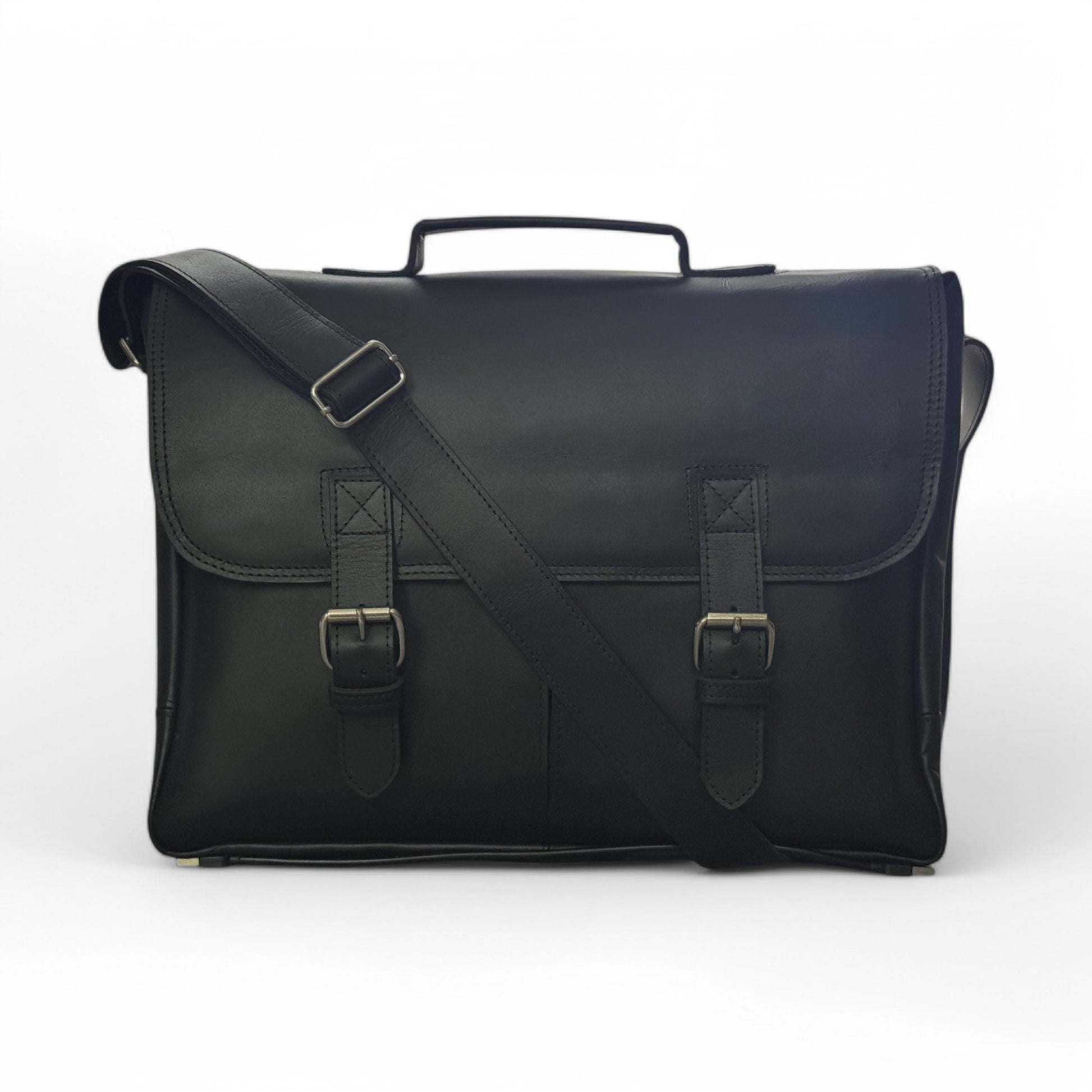 Front View – Full-grain leather messenger bag with buckle-strap front flap in vintage brown.

