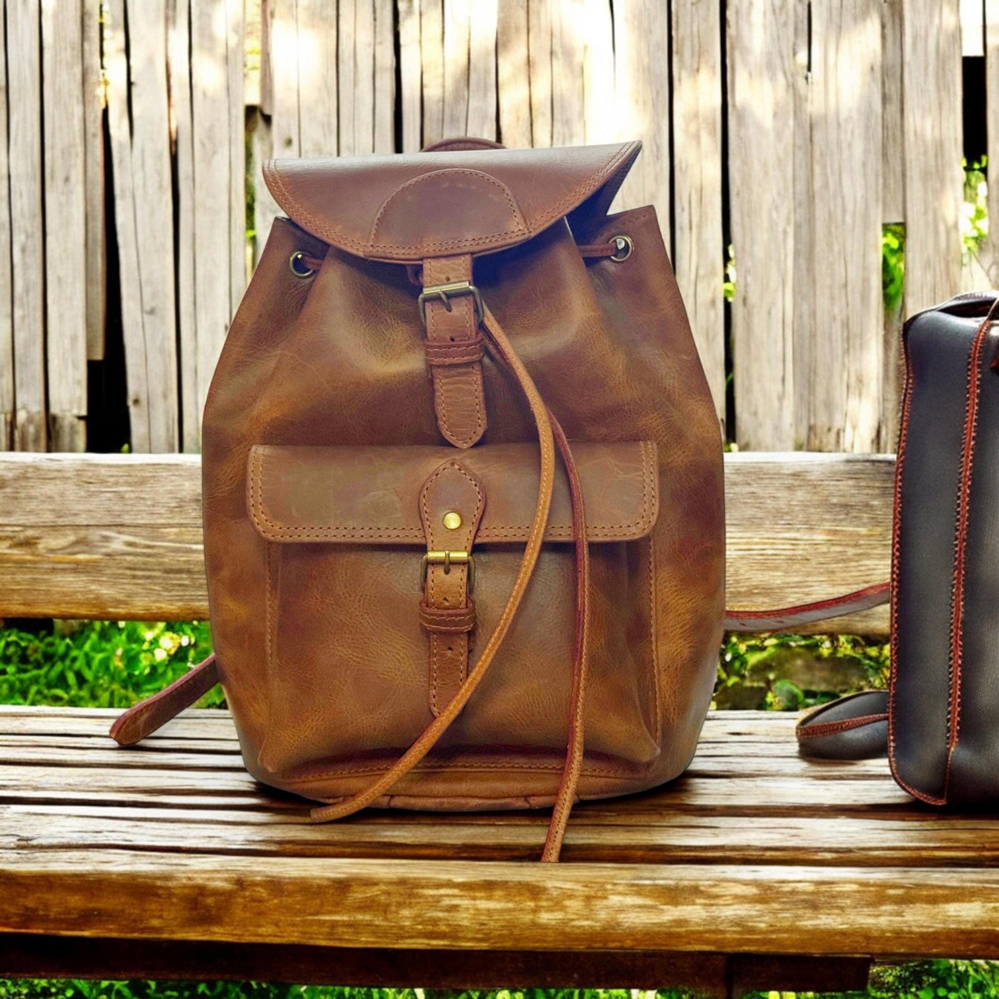 Side View – Side Angle Showing Backpack Depth and Leather Texture

