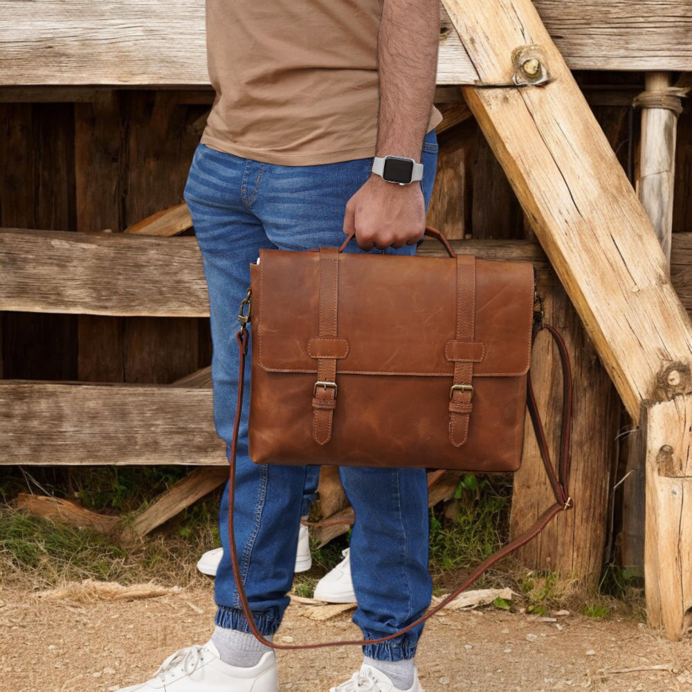 Front View – Leather messenger bag with classic flap and buckle clasp

