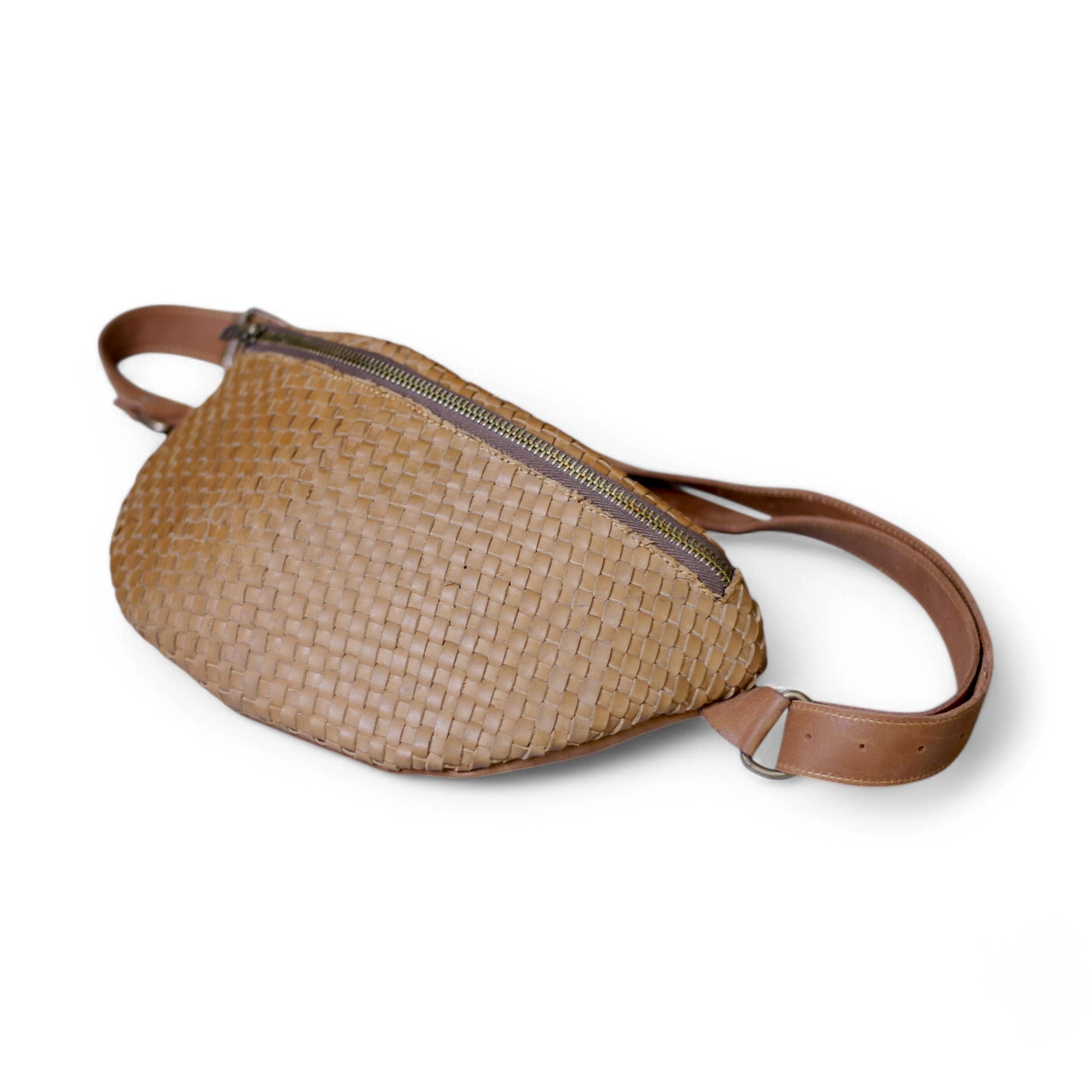 Front View – Stylish woven leather bumbag with sleek full-grain texture and front zip pocket.

