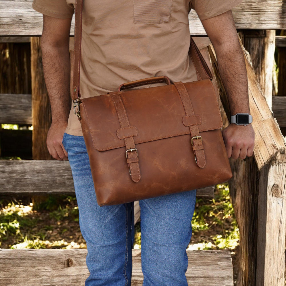 Front View – Leather messenger bag with classic flap and buckle clasp

