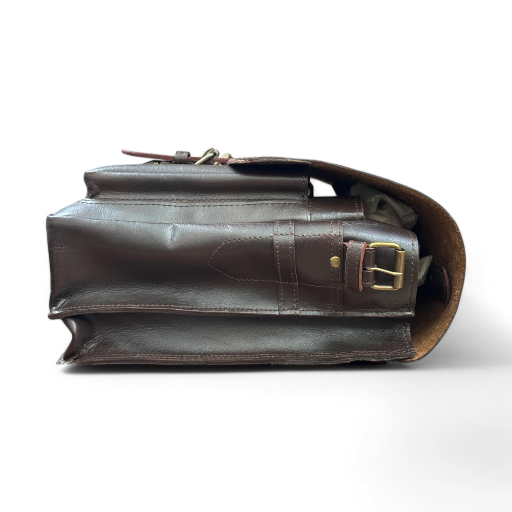 Side view showing briefcase depth and leather grain

