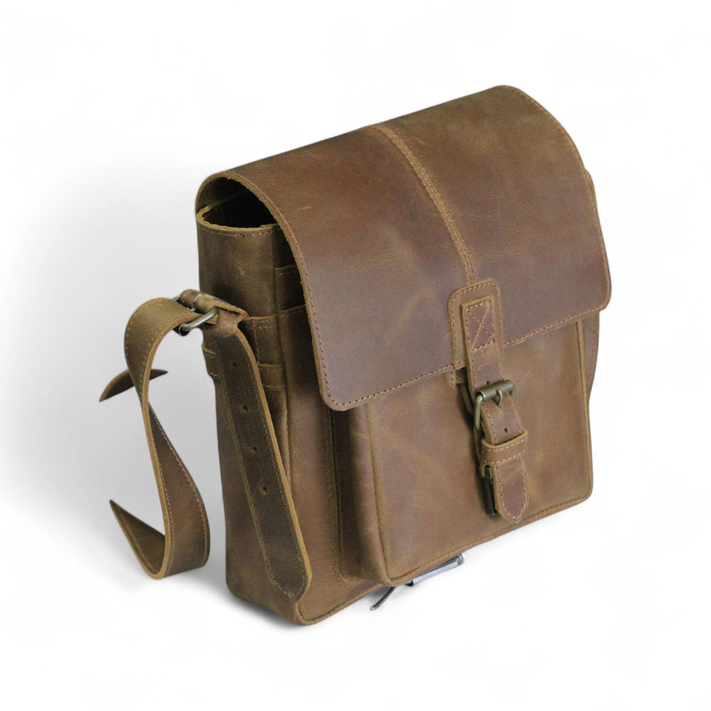 Front View – Front-facing view of the leather messenger bag showing buckle closure

